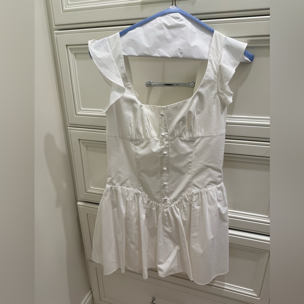 White Ruffle Sleeve Button-Front Romper- Amanda Uprichard